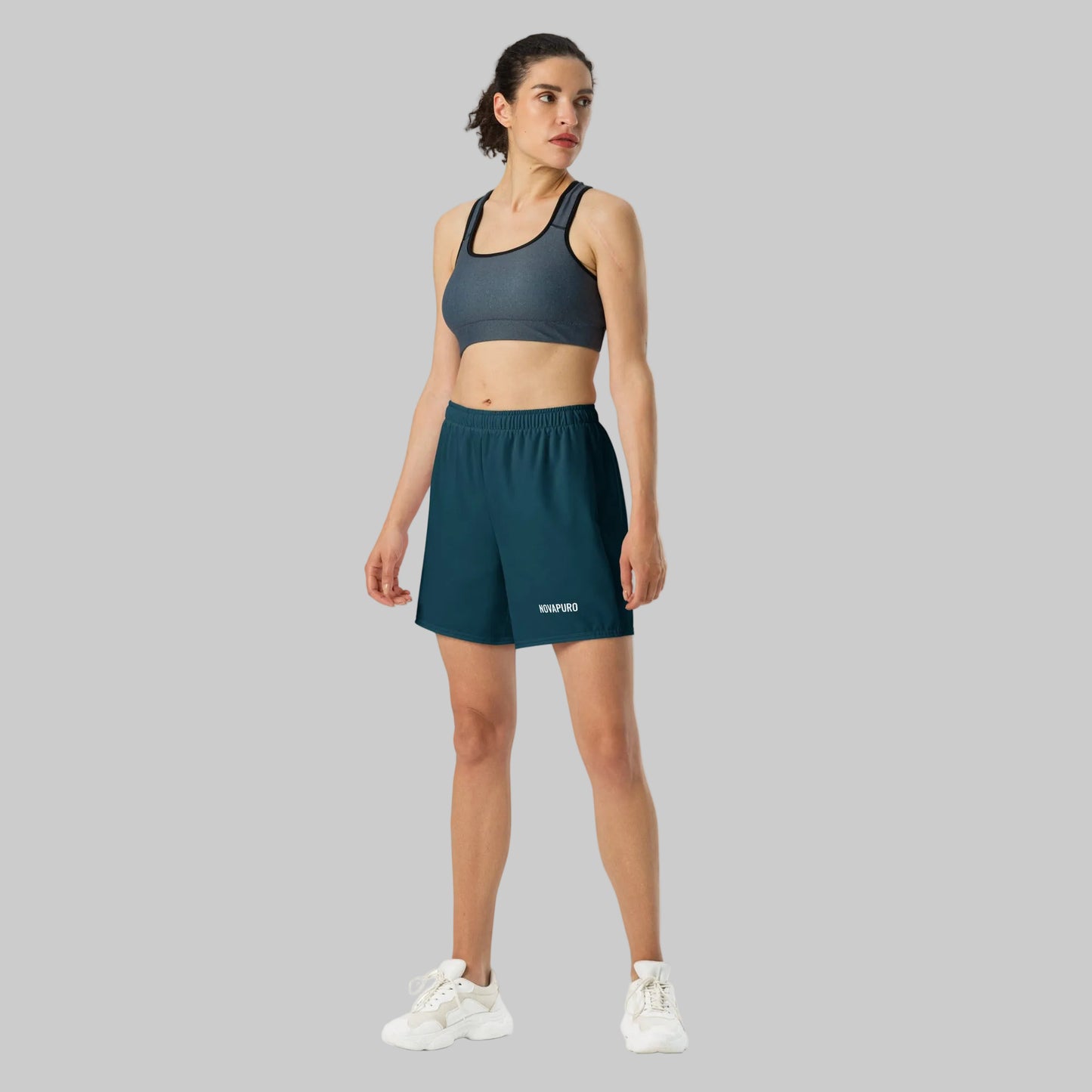Dark blue Novapuro Signature recycled athletic shorts on a white background