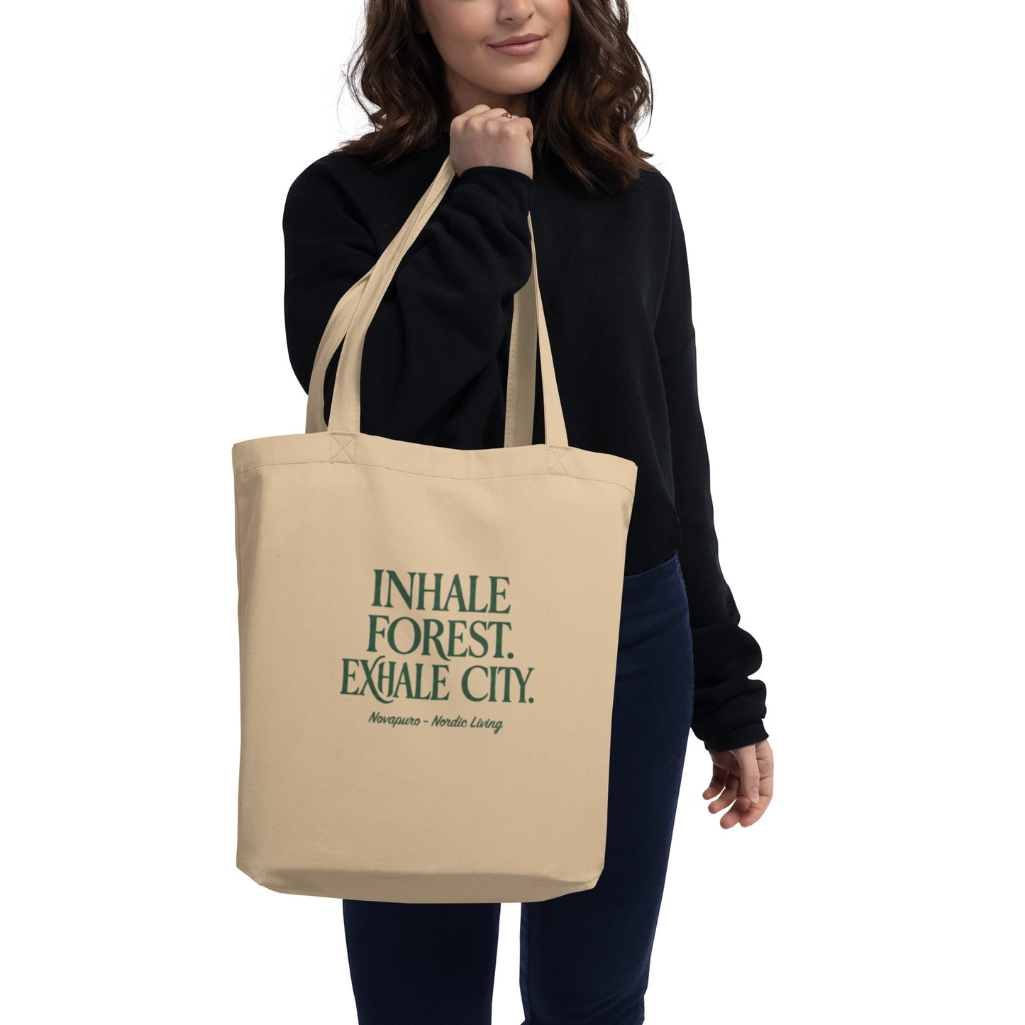 Novapuro Organic Cotton Tote Bag with Inhale Forest Exhale City text. Eco-friendly beige shopping bag.
