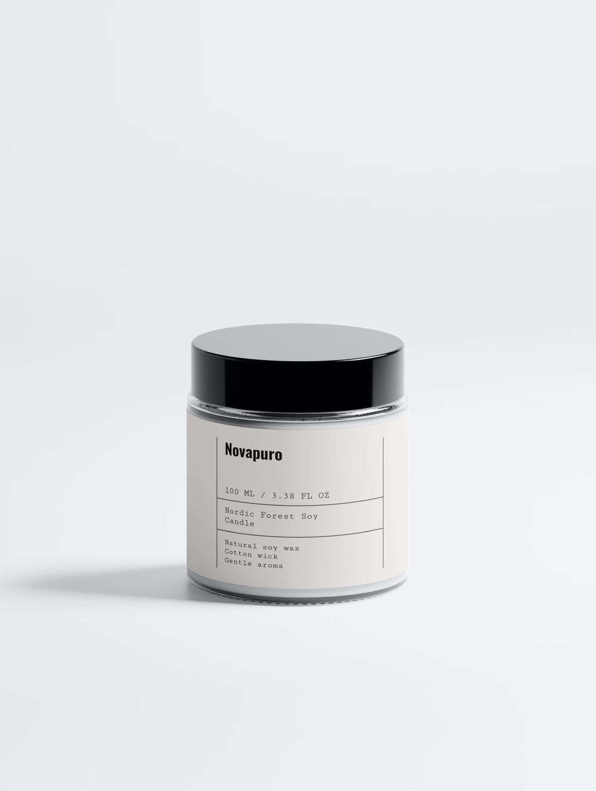 Minimalist glass jar of Novapuro Nordic Forest Moss soy wax candle, featuring an eco-friendly clean burn and earthy natural aromatherapy.