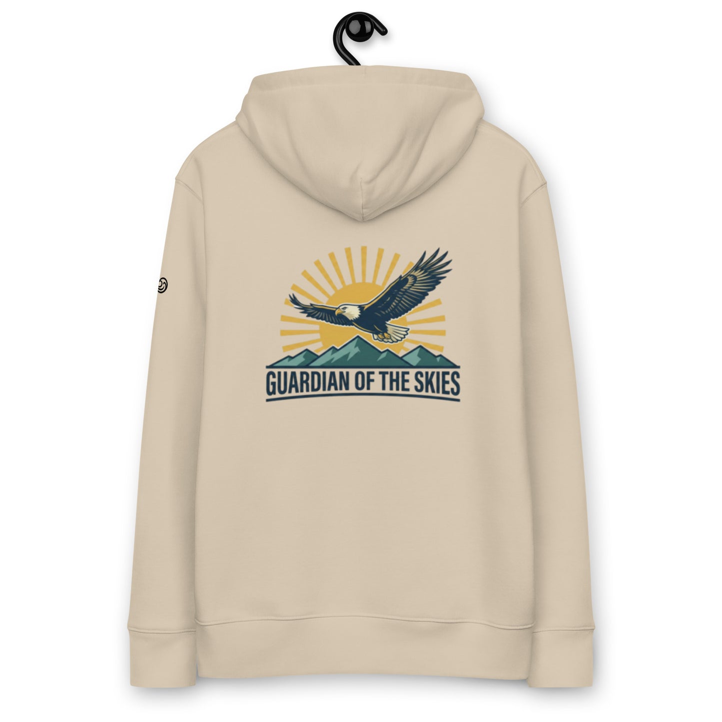 A Desert Dust colored eco-friendly hoodie featuring a large back print of a bald eagle soaring over mountains with a golden sun and the text "GUARDIAN OF THE SKIES".