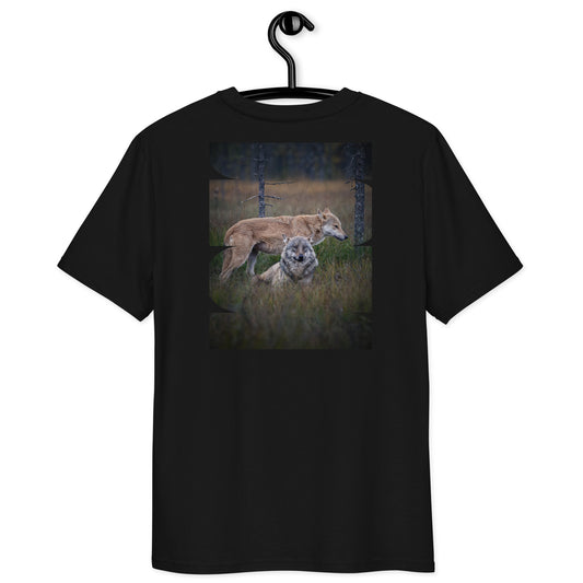 Back view of a black eco-friendly unisex t-shirt featuring the 'Leaders of the Pack' wolf photograph by Auli Leivonen. Premium 100% organic ring-spun cotton.