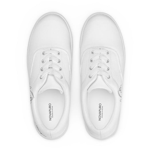 Minimalist white women's canvas sneakers with black First Bloom snowdrop design by Novapuro
