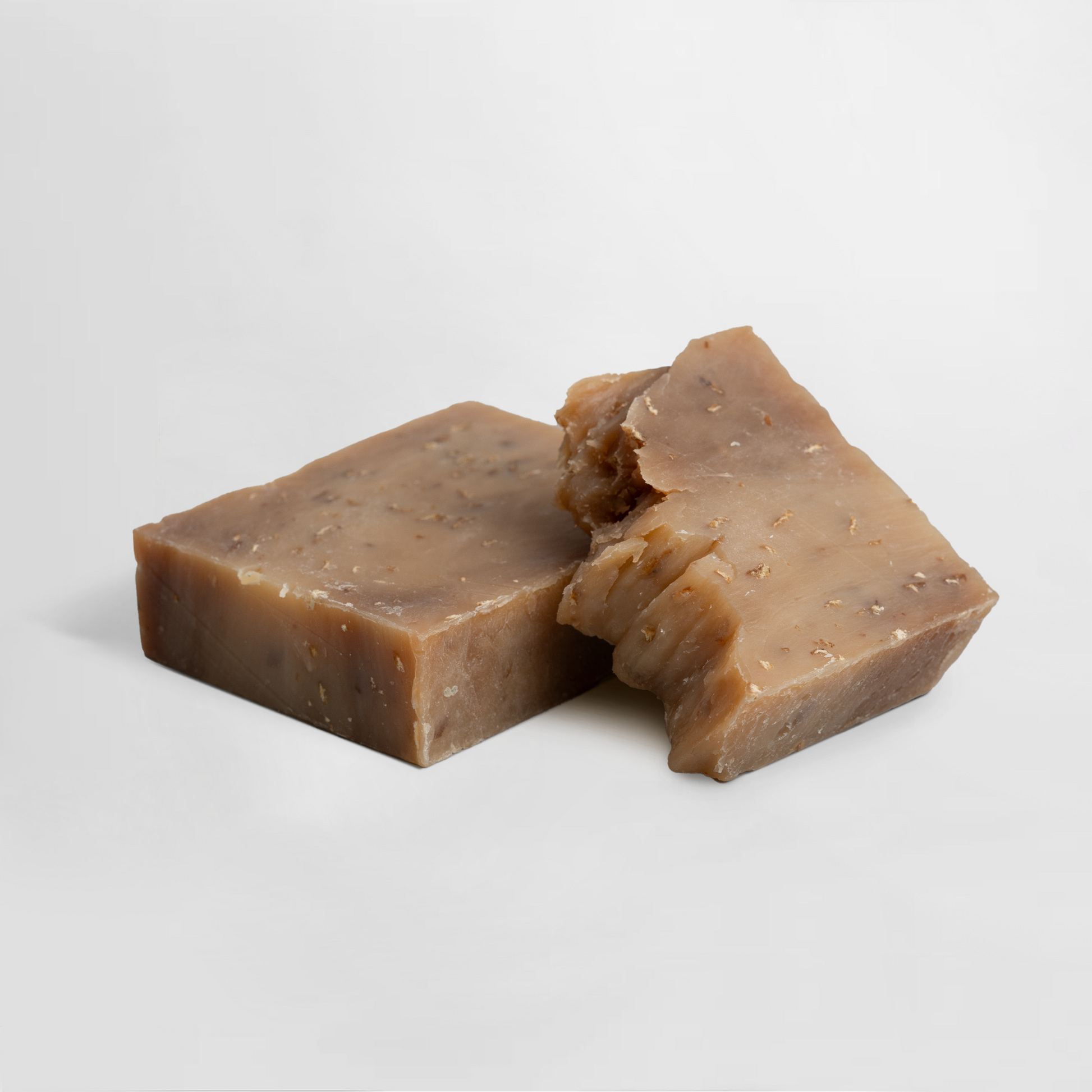 Handcrafted organic goat milk and honey soap by Novapuro for gentle skin exfoliation.