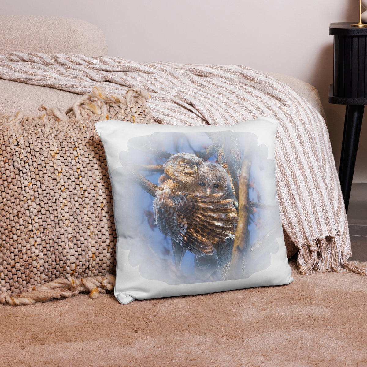 Novapuro x Auli Leivonen decorative throw pillow featuring a Nordic tawny owl duo nature design, resting on a cozy bed.
