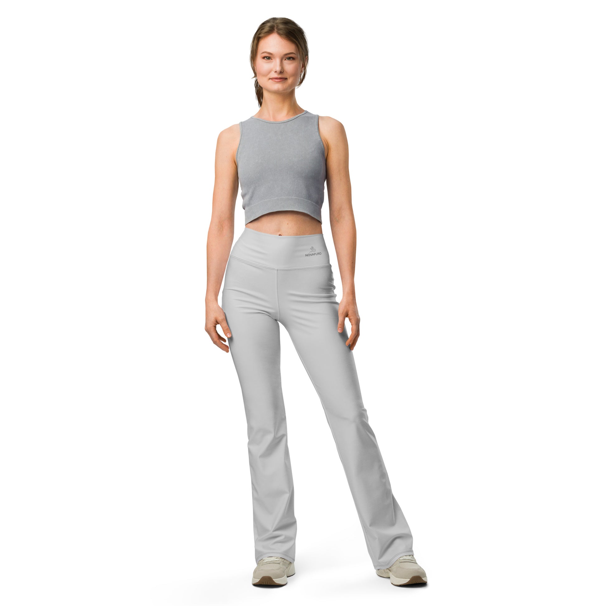 Woman wearing grey Novapuro Movement recycled flare leggings, high-waisted sustainable yoga pants