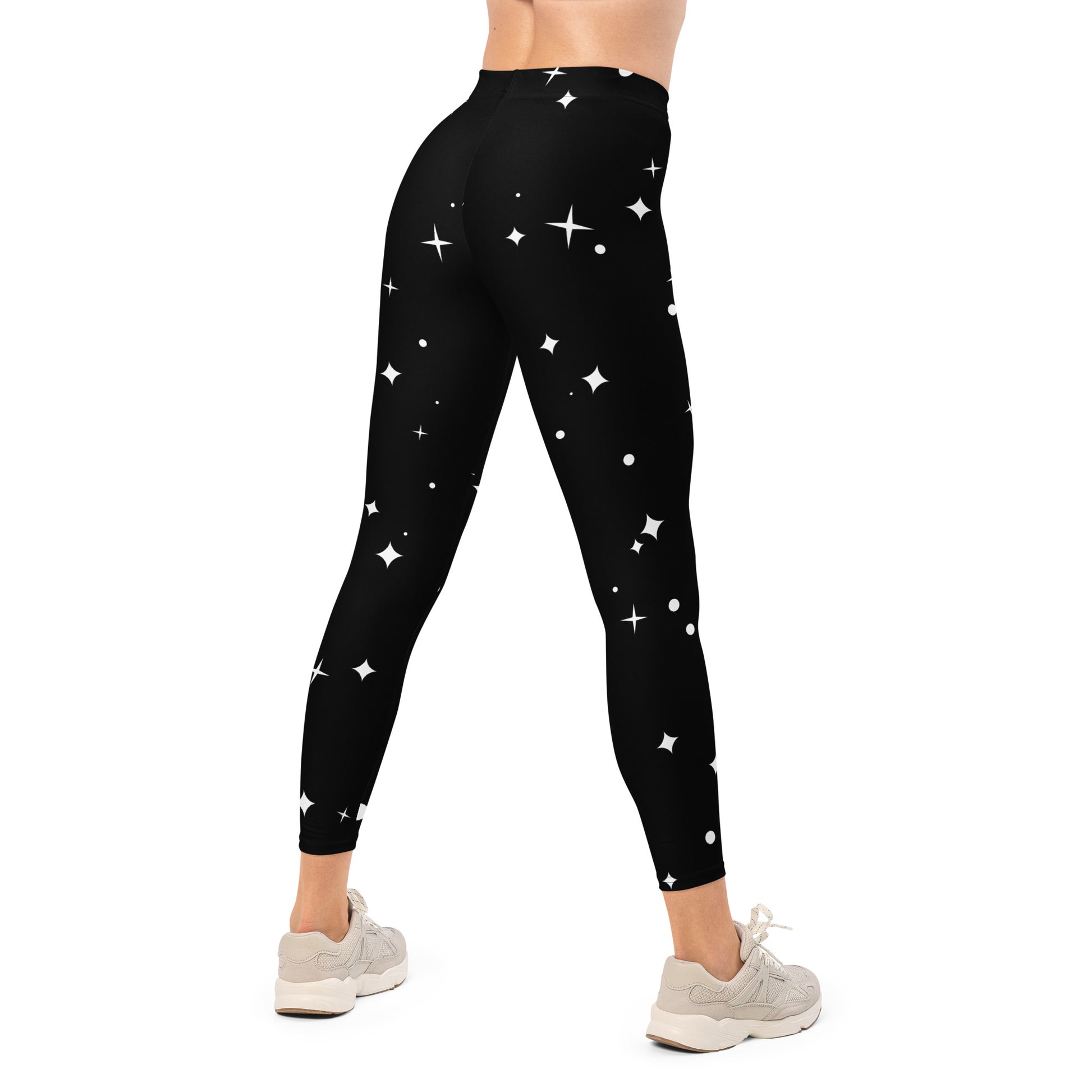 Woman wearing comfortable sustainable activewear leggings with a Nordic star pattern