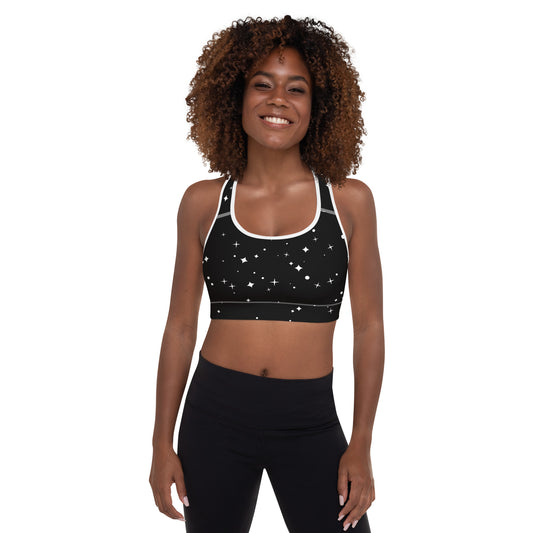 Woman wearing comfortable sustainable activewear sports bra with a Nordic star pattern