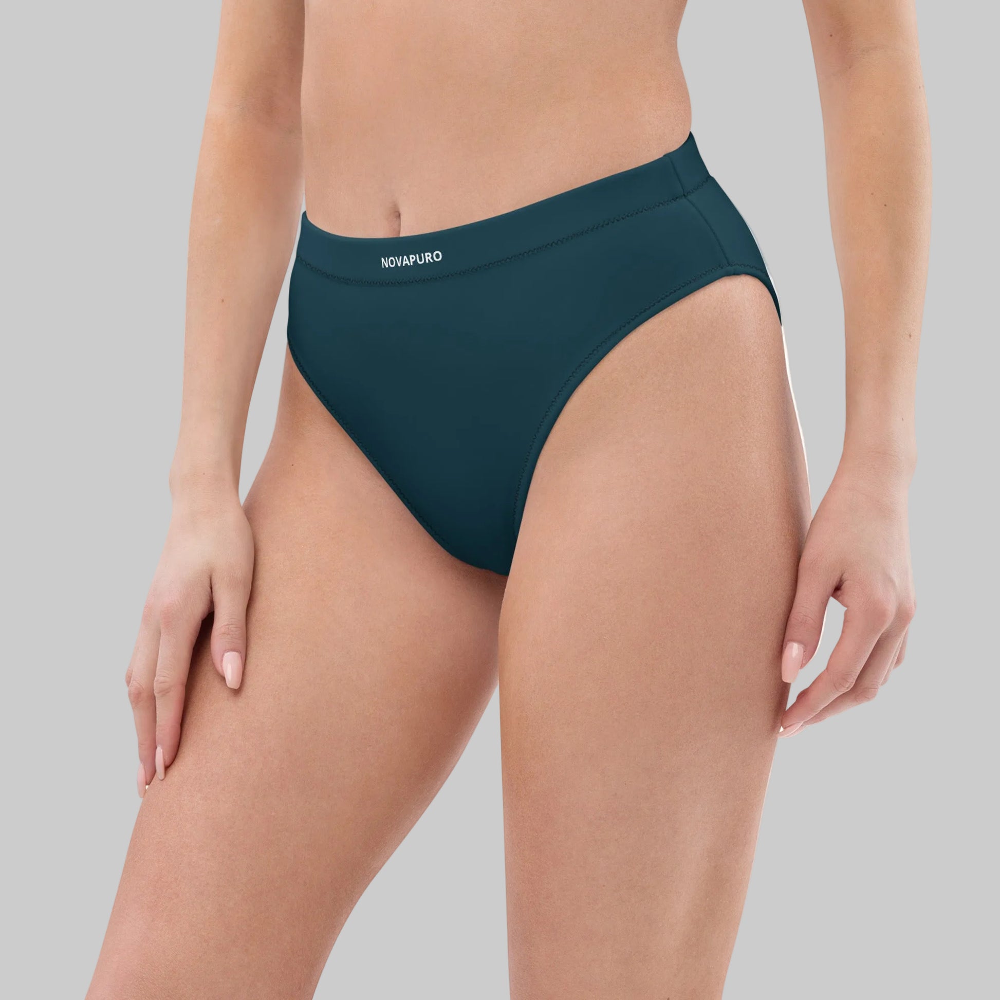 Dark blue Novapuro Signature recycled high-waisted bikini bottom on a model