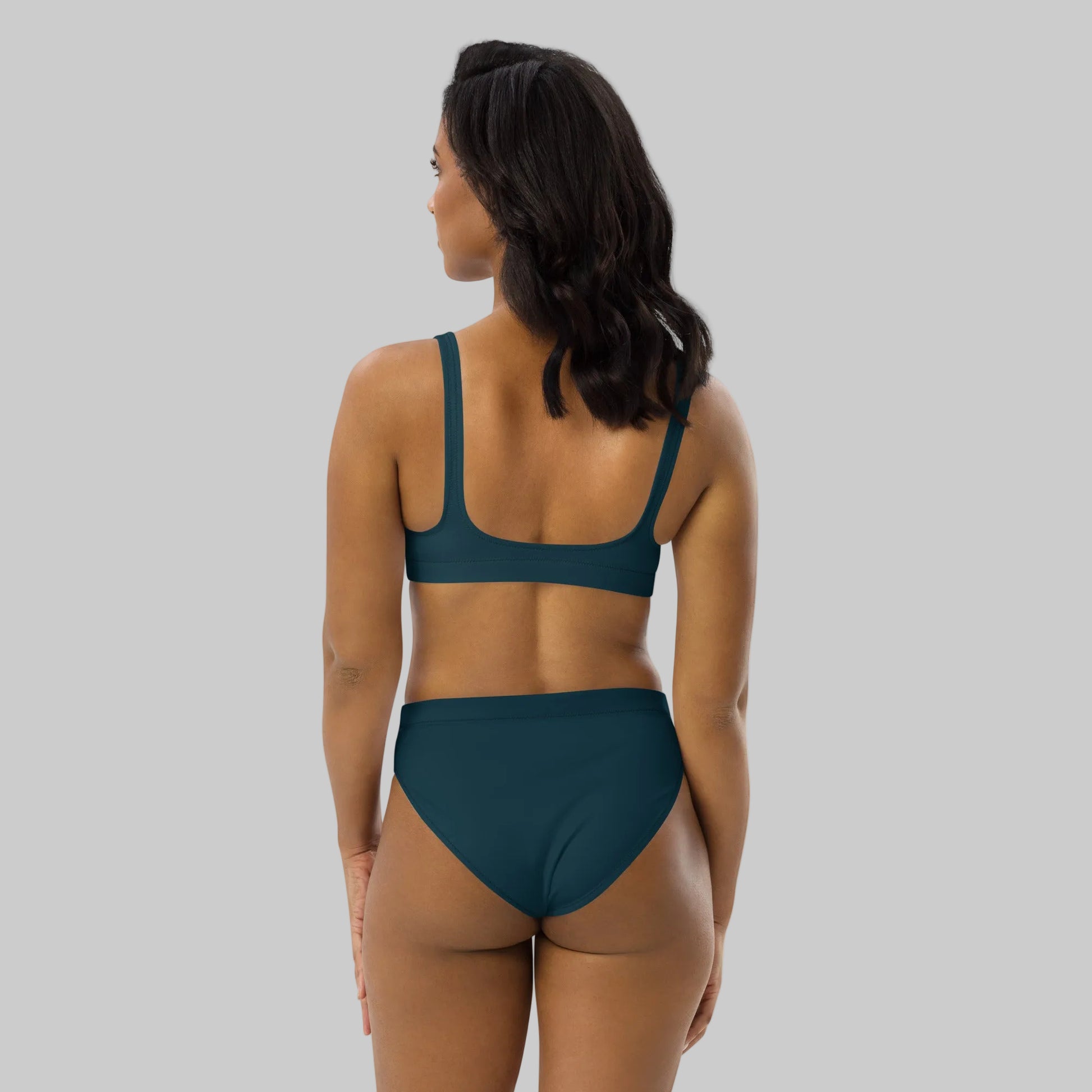 Back view of sustainable deep ocean blue high-waisted bikini set