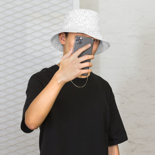 Versatile minimalist reversible bucket hat showcasing a clean Nordic aesthetic and abstract Spring Ice pattern, designed for sustainable streetwear by Novapuro