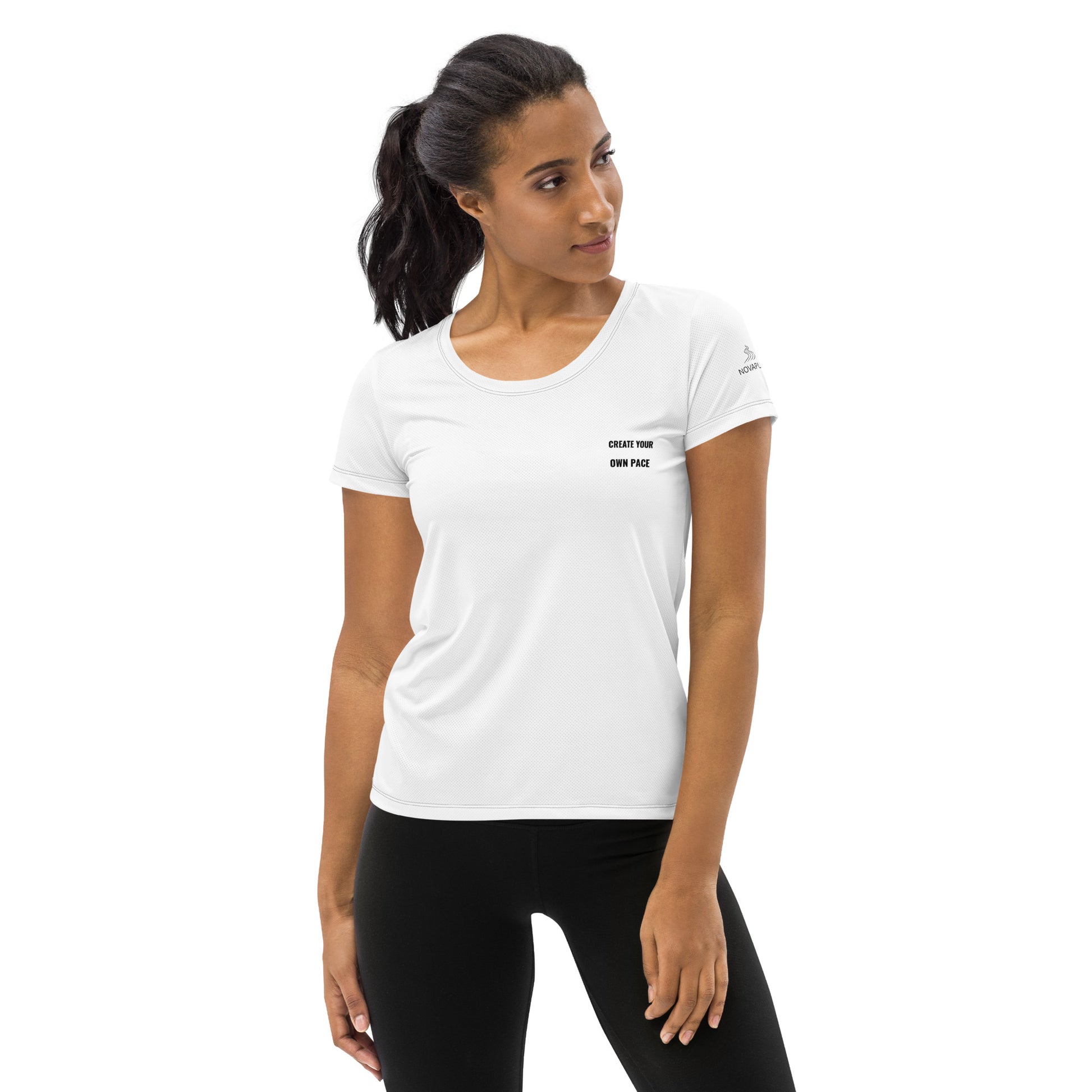 Woman wearing white Novapuro athletic t-shirt with Create Your Own Pace text, minimalist activewear design