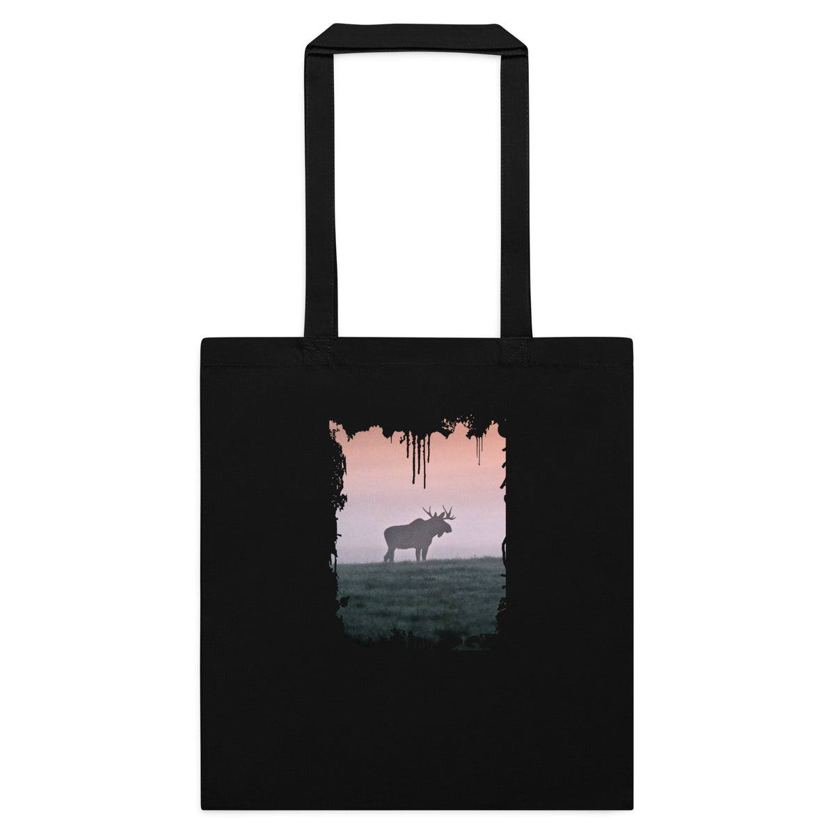 A black cotton tote bag featuring a distressed splash-edge front print of a majestic bull moose by Mikko Monto.