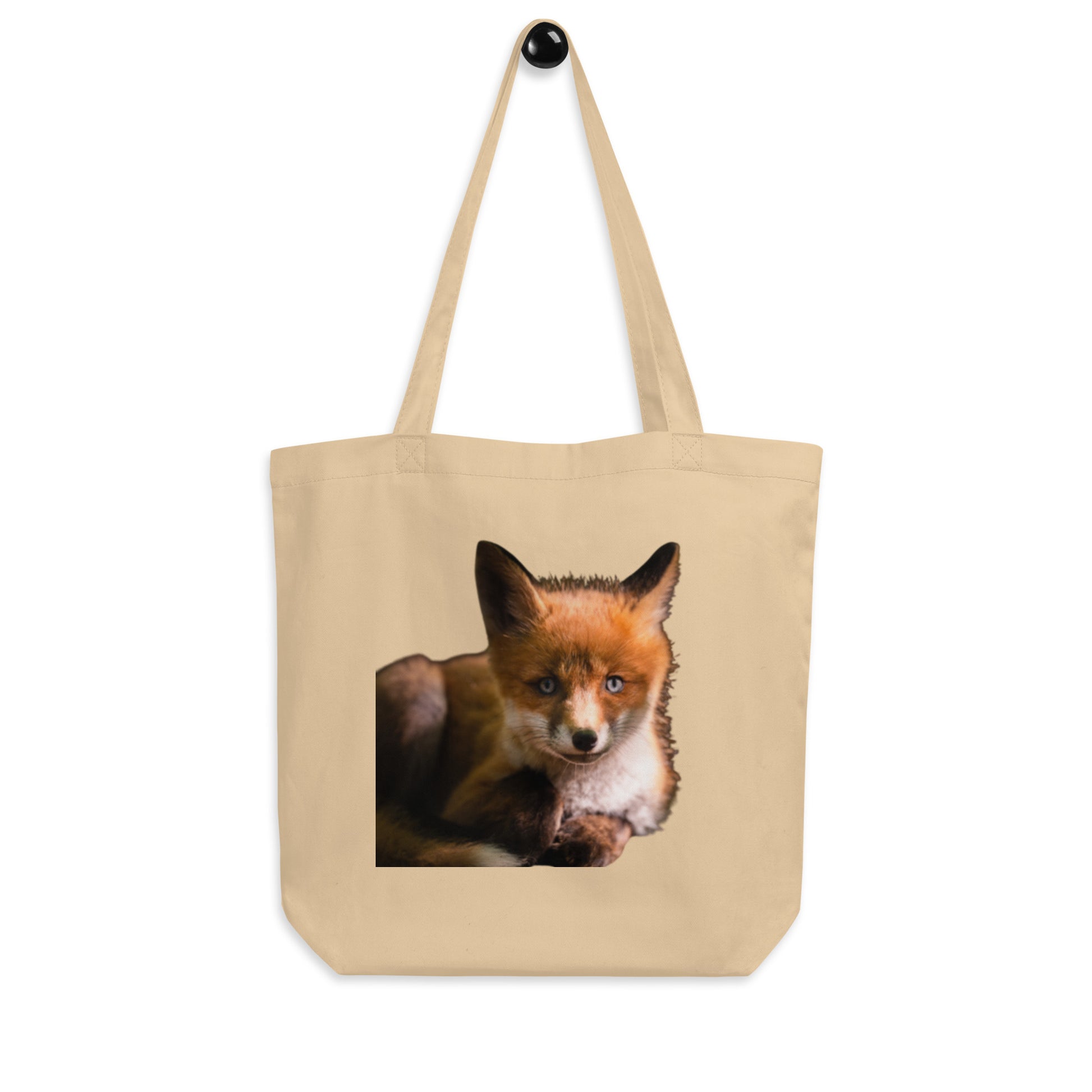 Front view of the sustainable organic cotton tote bag featuring Niko Laurila's original red fox wildlife photography