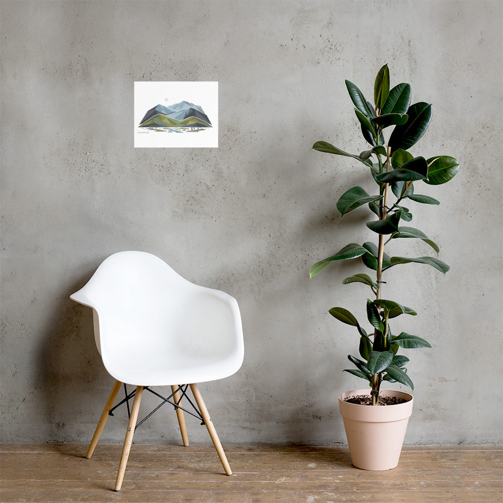 A horizontal enhanced matte paper poster displaying an abstract geometric illustration of Nordic mountains and nature in soft blue, green, and grey tones, hanging on a white wall.