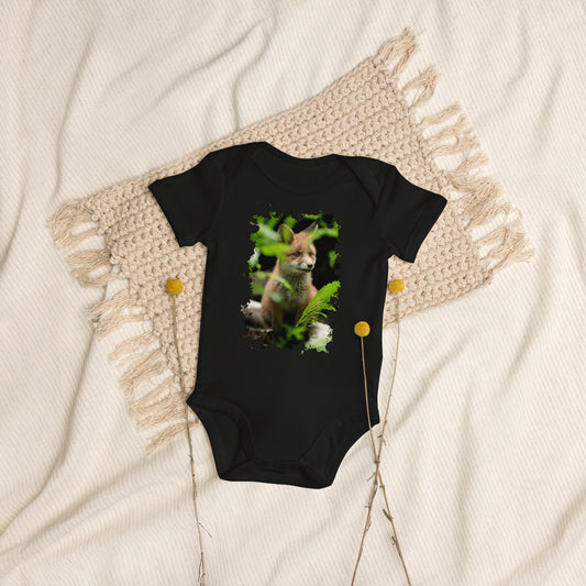 A black organic cotton baby bodysuit featuring an authentic Nordic fox wildlife photograph by Harri Maanoja.