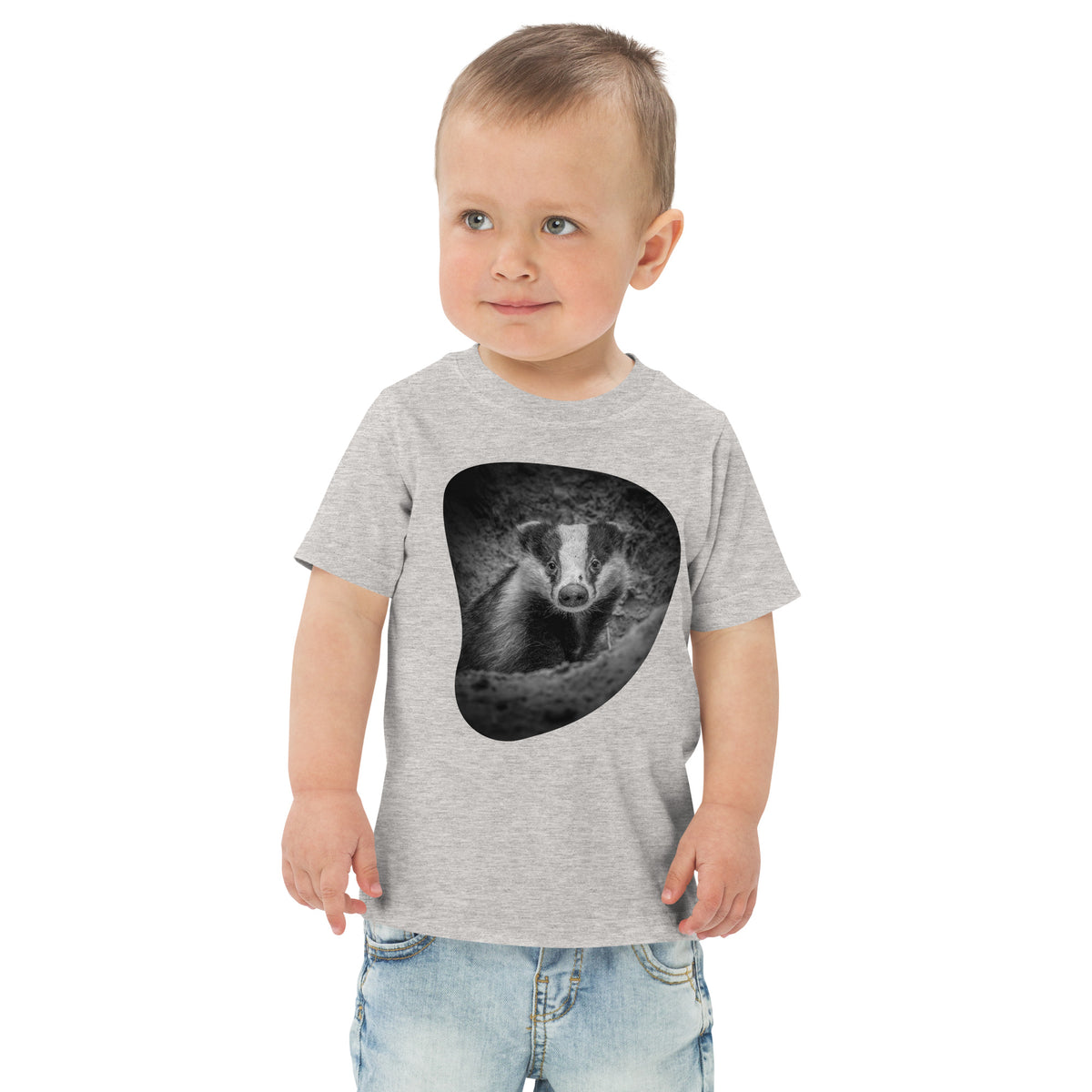 Heather gray toddler t-shirt featuring a detailed Nordic badger illustration, a nature-inspired collaboration between Novapuro and Auli Leivonen.