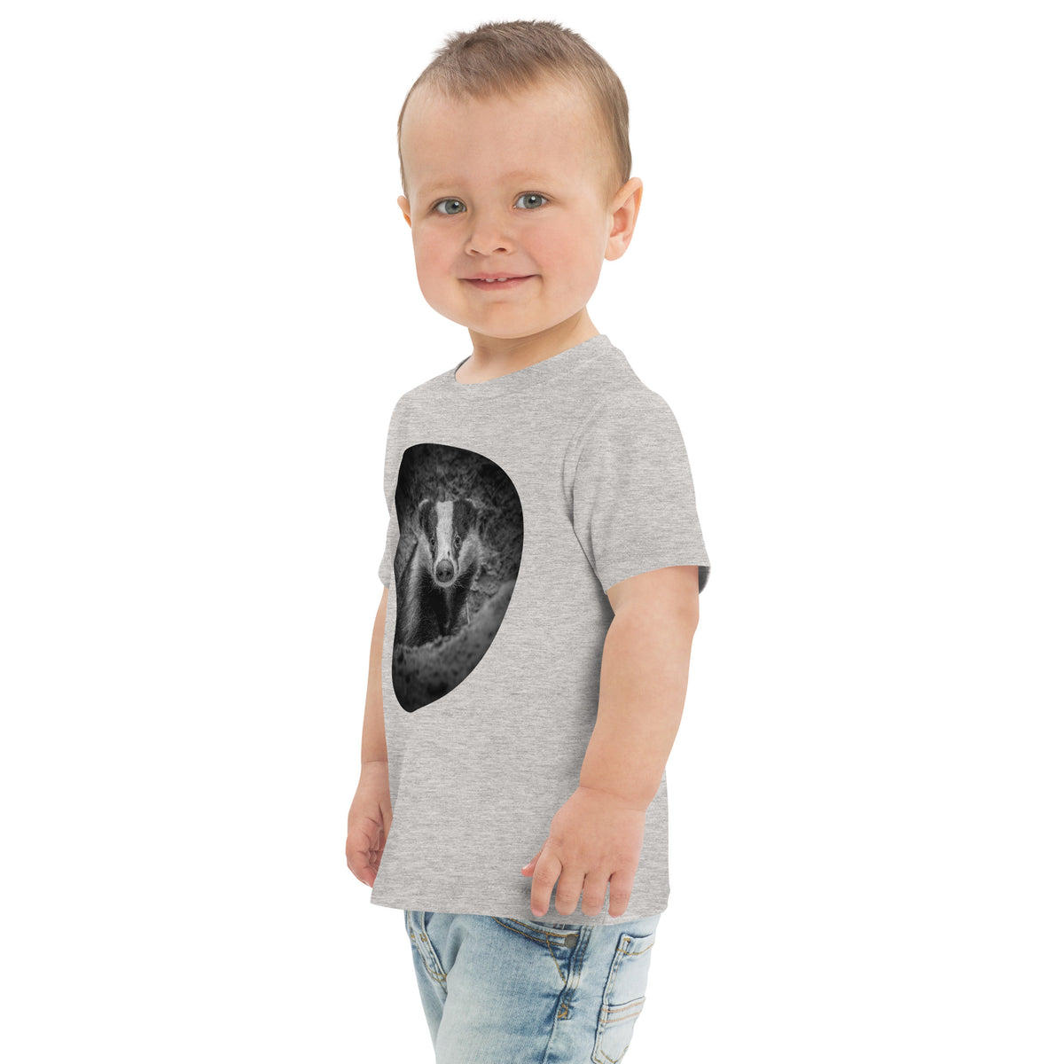 Heather gray toddler t-shirt featuring a detailed Nordic badger illustration, a nature-inspired collaboration between Novapuro and Auli Leivonen.