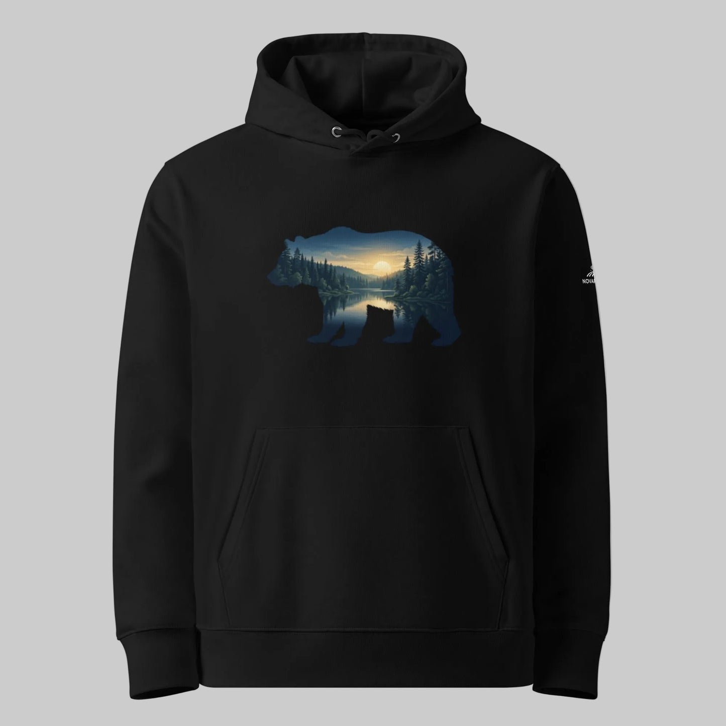 A black eco-friendly 100% organic cotton hoodie featuring a Nordic midnight sun bear silhouette design by Novapuro.