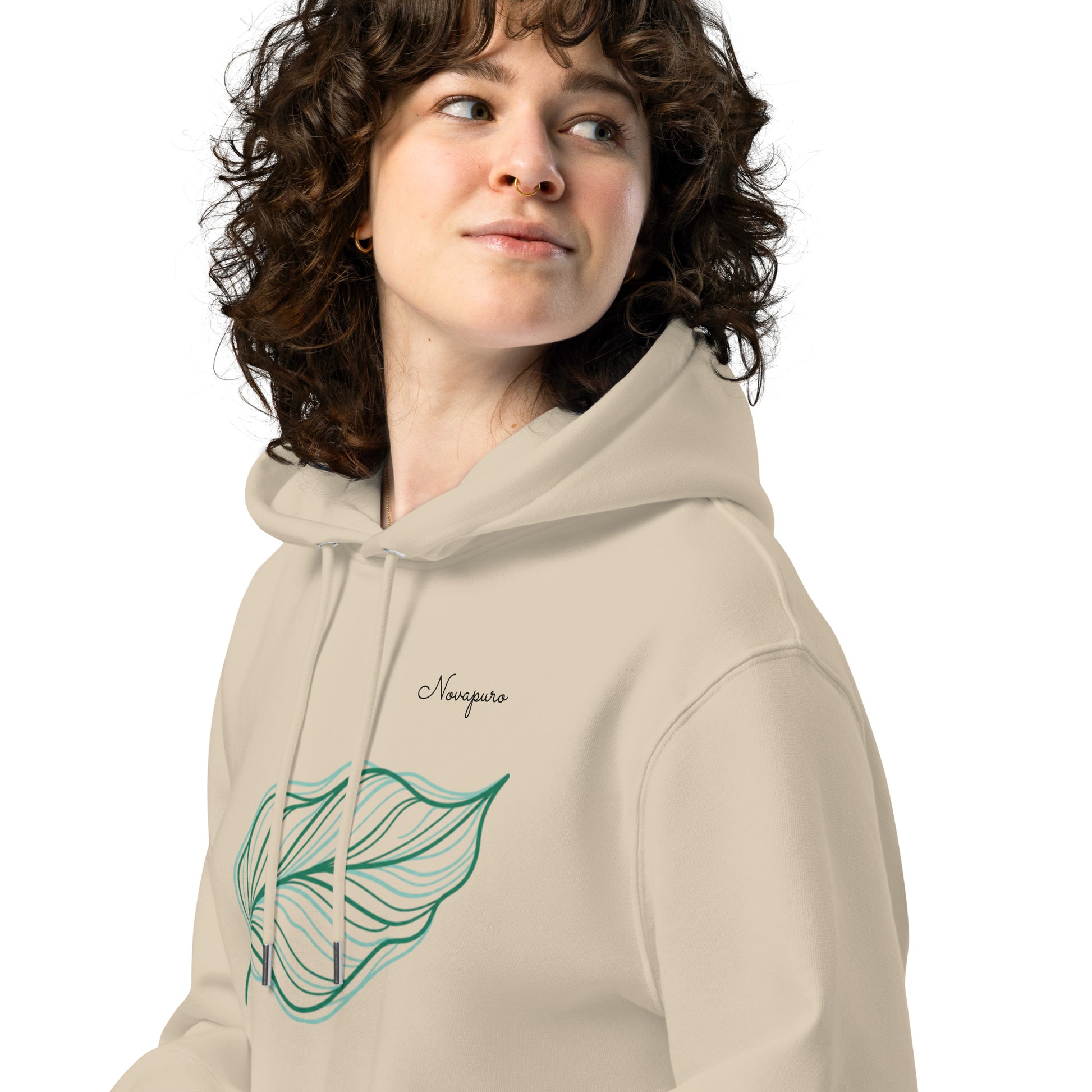 A light grey premium hoodie featuring a navy blue square on the chest with the white text "be the example." worn by a man.