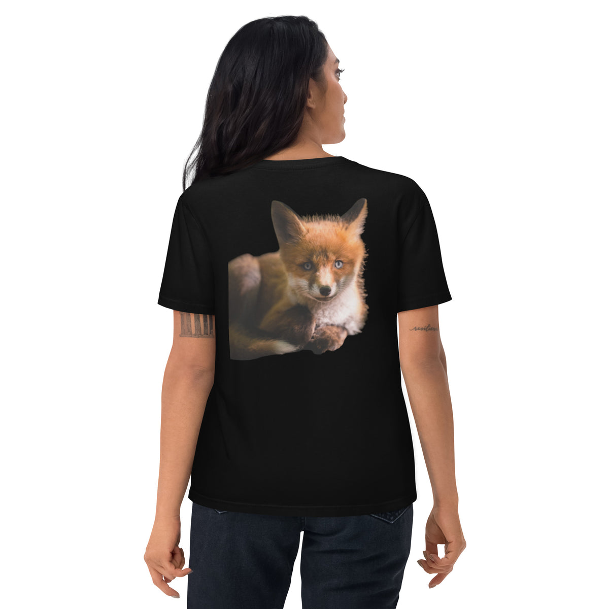 A woman wearing the black Niko Laurila x Novapuro organic cotton t-shirt, showcasing the back print of a captivating red fox photograph.   