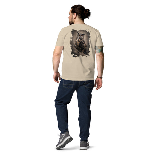 Man wearing a sand-colored Novapuro organic eco t-shirt featuring the striking Eagle Owl's Gaze artwork on the back by Jarno Virtanen. Sustainable Nordic fashion.
