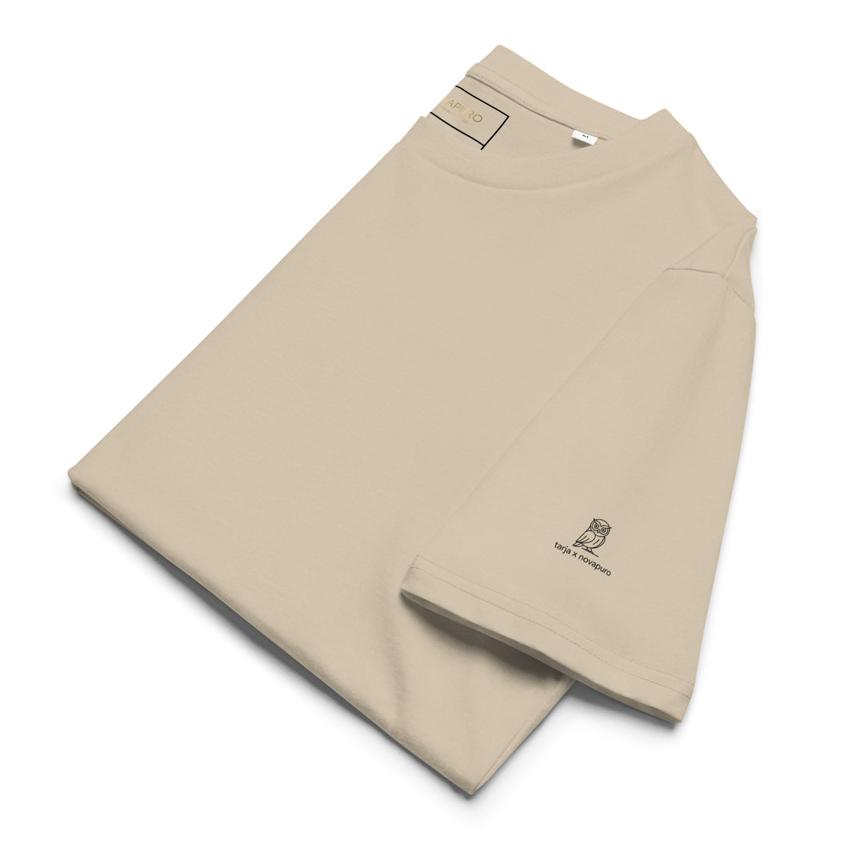 Close-up of the folded Ural Owl Organic T-Shirt, emphasizing the high-quality, super comfy, and eco-friendly fabric.