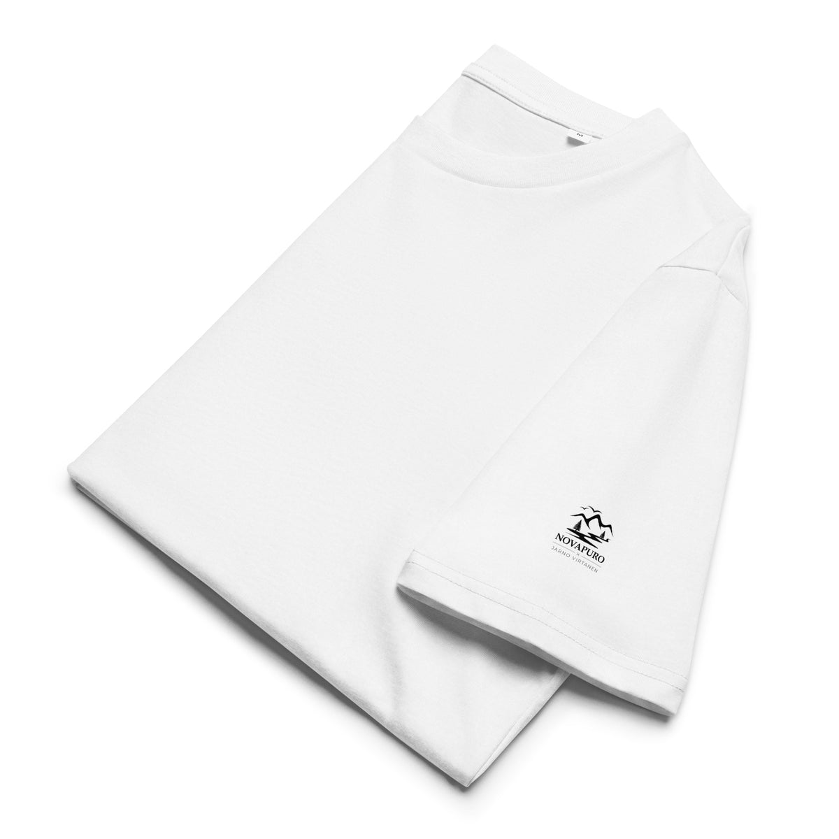 Detailed close-up of a folded white premium organic cotton t-shirt. Soft, eco-friendly, and designed with sustainable zero-waste principles.