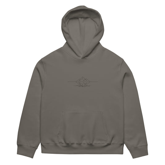 Khaki brown oversized heavyweight hoodie featuring a minimalist black continuous line art of a mountain peak reflecting on a lake