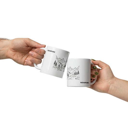 Novapuro Adventure Buddy ceramic coffee mug. Minimalist Nordic design featuring two hikers and mountain landscape. Perfect Valentine's Day gift for nature lovers and hiking friends. White glossy finish.