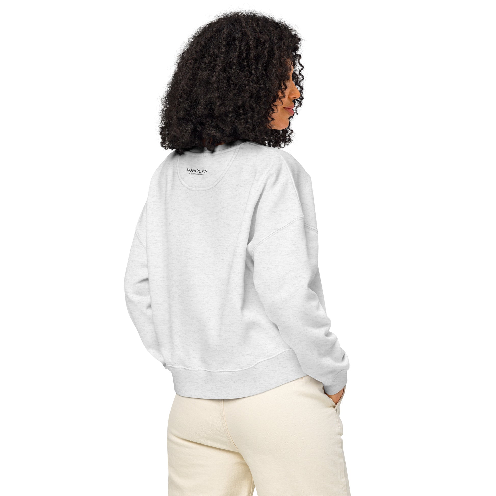 Back and side view of a woman modeling a relaxed fit white organic fleece sweatshirt.