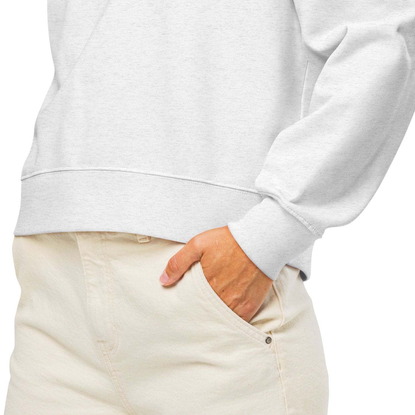 Close-up of the ribbed bottom hem and comfortable fabric of the white women's organic crew neck sweatshirt.