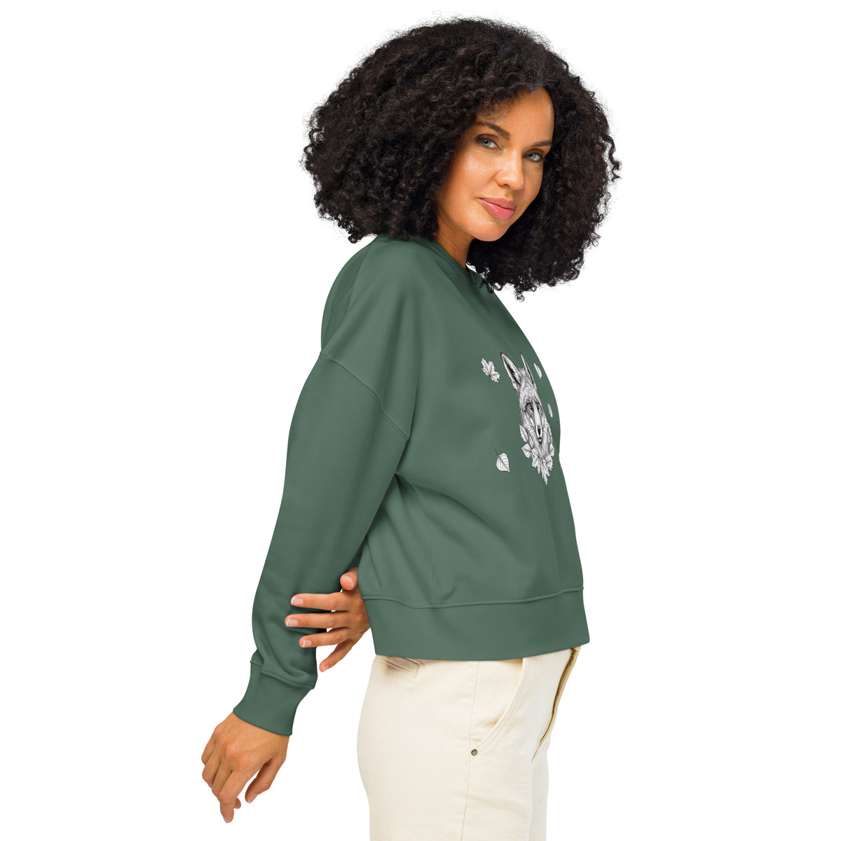 Back view of a woman wearing the eco-friendly green premium organic cotton sweatshirt designed for everyday Nordic adventures.