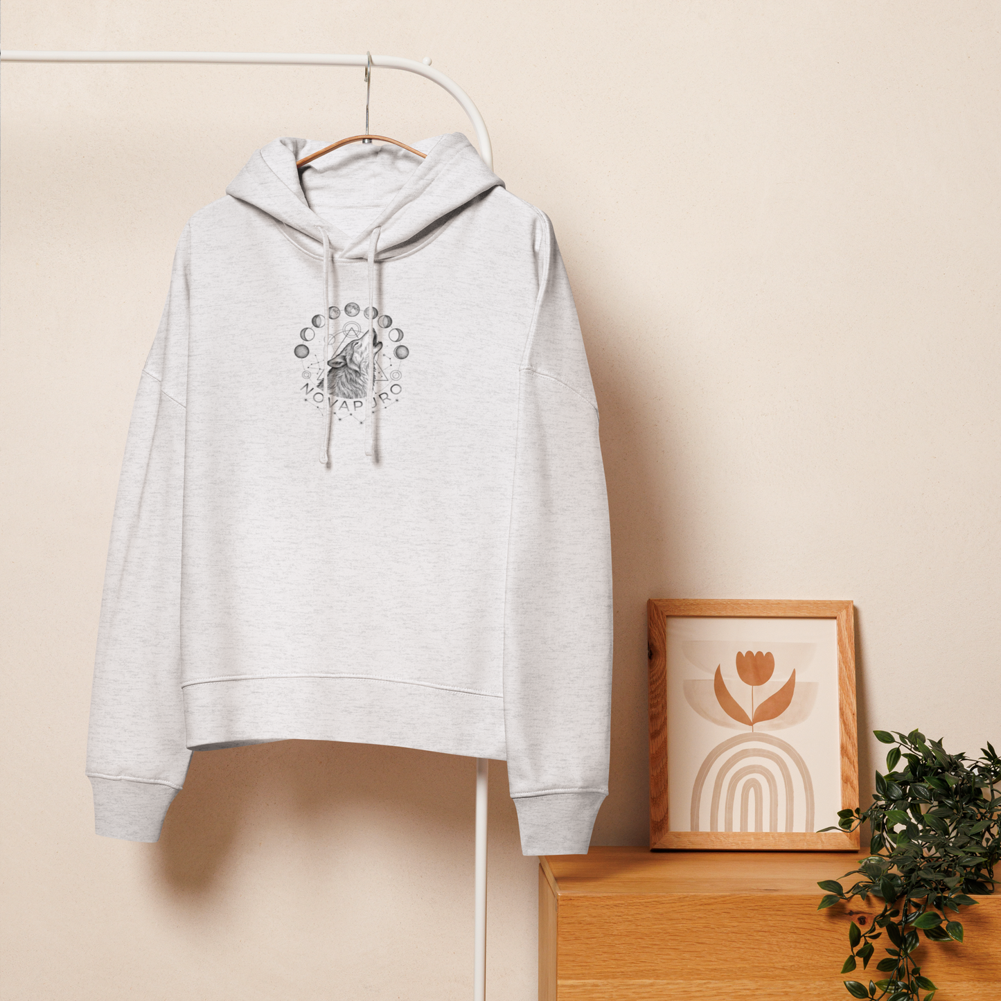 White premium women's organic mid-weight hoodie featuring a minimalist double exposure Lunar Wolf and moon phases graphic. Sustainable Nordic streetwear.