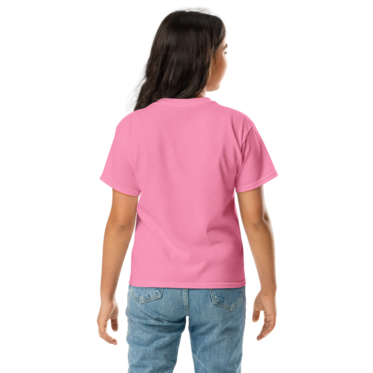 Back view of a young girl wearing the eco-friendly pink premium cotton t-shirt designed for everyday Nordic adventures.